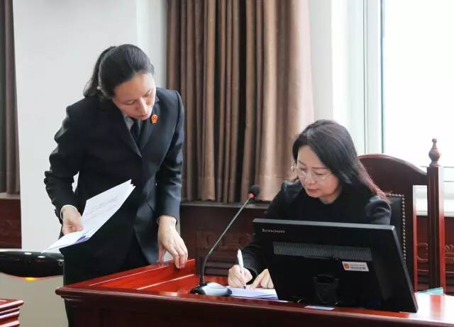 被告签署调解书.jpg